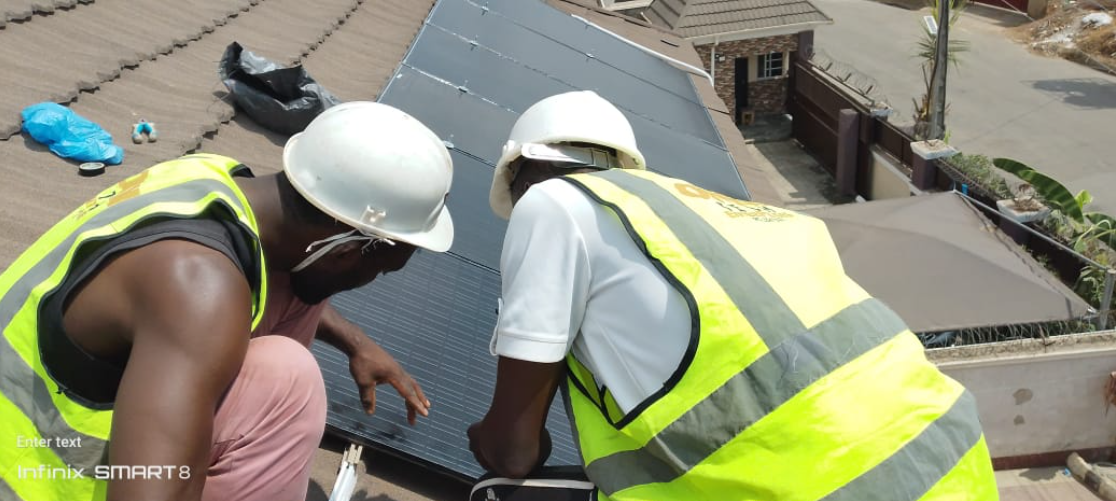 Crew Fitting Rooftop Panels